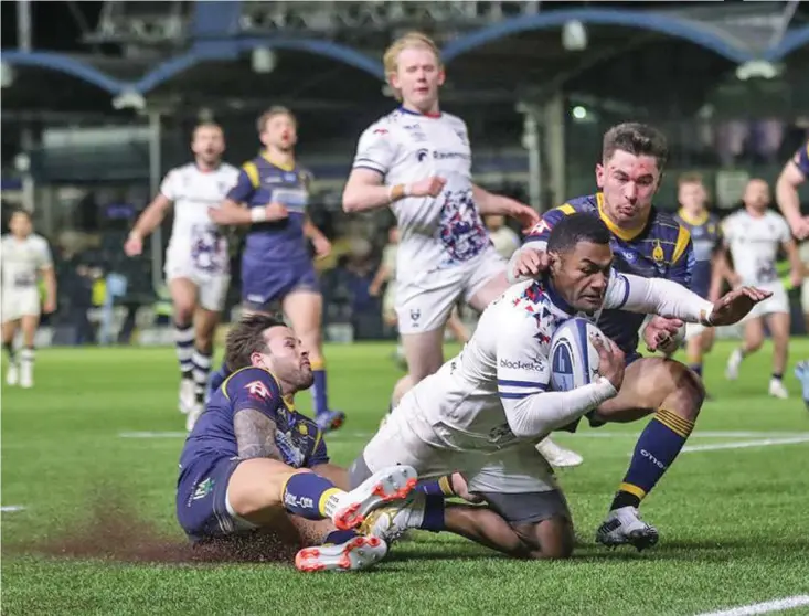  ?? Photo: Bristol Live ?? Fijian- born Bristol Bears winger Siva Naulago scores one of his three tries in the Premiershi­p Rugby clash against Worcester Warriors at the Sixways Stadium in England on March 6, 2021.