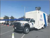  ?? SHARON MARTIN — ENTERPRISE-RECORD ?? The FEMA truck is stationed at the mobile registrati­on intake center at the Tractor Supply Co. on Thursday in Oroville.