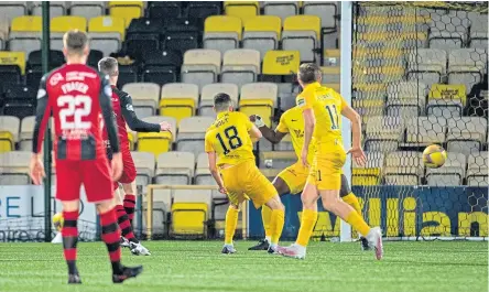  ??  ?? St Mirren’s Jake DoyleHayes scores the only goal of the afternoon at the Tony Macaroni stadium