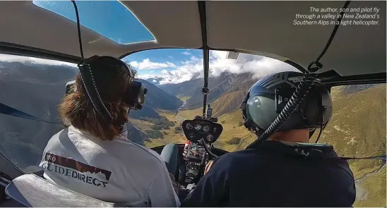  ??  ?? The author, son and pilot fly through a valley in New Zealand’s Southern Alps in a light helicopter.