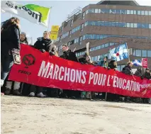  ?? P H I L C A R P E N T E R / MO N T R E A L G A Z E T T E F I L E S ?? Anti- austerity protesters at a February march denounced cuts to universiti­es and Fonds de recherche du Québec. The protest was organized by the FEUQ.