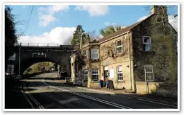  ??  ?? The Hope and Anchor pub, with the bridge that carried the Somerset & Dorset line into Midford station. The Titfield branch crossed below the S&D to the left.