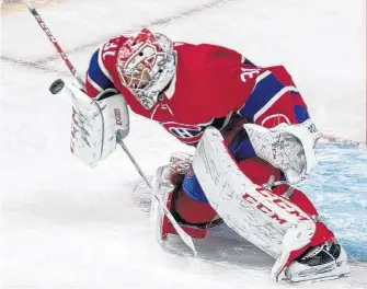  ?? MONTREAL GAZETTE ?? Montreal Canadiens goaltender Carey Price makes a stop against the Florida Panthers at the Bell Centre in Montreal on Feb. 1.