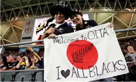  ??  ?? Supporters welcome the All Blacks to Oita for last week’s World Cup game against Canada. Photograph: David Ramos/World Rugby via Getty Images