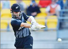  ?? WELLINGTON, Feb 13, (AFP): Completed scoreboard in the fourth Twenty20 Tri-series match between New Zealand and England in Wellington on Tuesday:
M. Guptill c Plunkett b Rashid ......................... 65 C. Munro c Billings b Wood ..................... ?? New Zealand’s Kane Williamson bats during the first Twenty20 cricket match between New
Zealand and England at Westpac Stadium in Wellington on Feb 13. (AP)