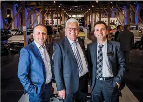  ??  ?? Walter Frey (centre) with sons Markus (left) and Joachim at the museum’s 2017 opening ceremony