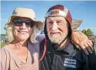  ??  ?? Veteran balloonist Peter King and crew member Jane Fuller, from Carterton, prepare for their flight.