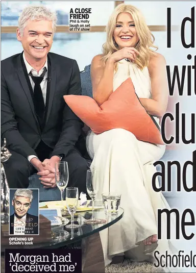  ??  ?? A CLOSE FRIEND Phil & Holly laugh on set of ITV show