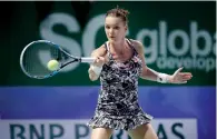  ?? AP ?? Agnieszka Radwanska makes a forehand return to Karolina Pliskova during their singles match. —