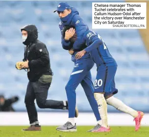  ?? SHAUN BOTTERILL/PA ?? Chelsea manager Thomas Tuchel celebrates with Callum Hudson-Odoi after the victory over Manchester City on Saturday