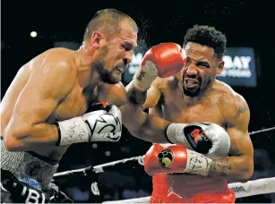  ?? JOHN LOCHER/ASSOCIATED PRESS FILE PHOTO ?? Andre Ward, right, hits Sergey Kovalev in June during Ward’s final fight in Las Vegas, Nev. Ward announced Thursday he was retiring from boxing, leaving with a record of 32-0 and 16 knockouts.