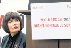  ?? CP PHOTO ?? Minister of Health Ginette Petitpas Taylor listens to a speaker during an event marking World AIDS Day in Ottawa on Friday.