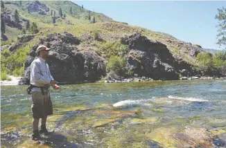  ?? ASSOCIATED PRESS ?? Partie de pêche à la truite dans la rivière Boise, en Idaho