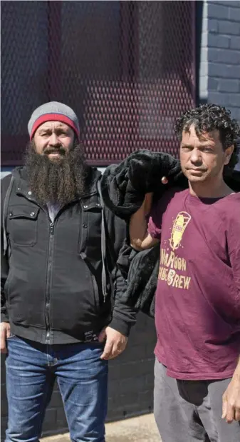  ?? PHOTO: KEVIN FARMER ?? SLEEPING ROUGH: Nat Spary (left) and Darrell Hiles at the Basement Soup Kitchen in Toowoomba.