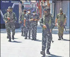  ?? ANI ?? Security personnel in Srinagar on Thursday.