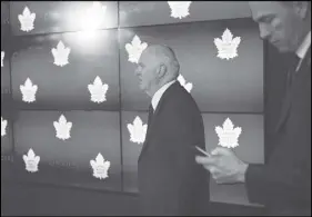  ?? CP PHOTO ?? Toronto Maple Leafs general manager Lou Lamoriello enters an end-of-season news conference in Toronto.