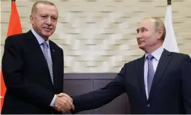  ??  ?? Recep Tayyip Erdoğan (left) is greeted by Vladimir Putin before their meeting in Sochi, Russia. Photograph: Mikhail Metzel/Tass