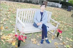  ??  ?? Christine Patterson at the memorial bench to her husband