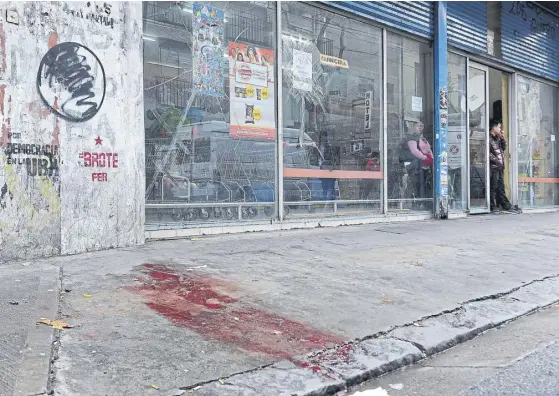  ?? Archivo ?? En mayo de 2014 el dueño de este supermerca­do chino, en Urquiza 178, fue asesinado después de ser amenazado