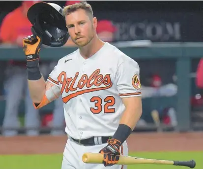  ?? KARL MERTON FERRON/BALTIMORE SUN ?? Orioles batter Ryan O’Hearn walks off after striking out as a pinch hitter during the seventh inning of Wednesday’s 1-0 loss against the Cardinals.