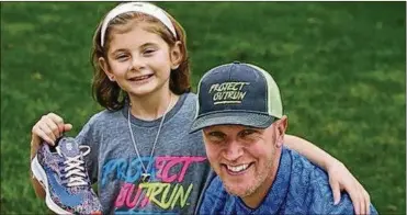  ?? PHIL MASTURZO PHOTOS / BEACON JOURNAL ?? Kylie Jacobs shows the Nike shoe she designed with Andrew Shepperd, the founder of Project Outrun, recently in Copley.