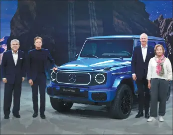  ?? PHOTOS PROVIDED TO CHINA DAILY ?? From left: Mercedes-Benz’s all-new electric G-Class makes its global debut ahead of the Auto China show in Beijing on Wednesday.