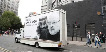  ?? (Lee Smith/Action Images via Reuters) ?? A VAN drives outside St. James’ Park with a picture of murdered Saudi journalist Jamal Khashoggi and Saudi Crown Prince Mohammad bin Salman, in protest to the takeover of the Newcastle United soccer club by a company chaired by MBS, in October.