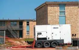  ?? Mark Mulligan / Staff photograph­er ?? A generator powered Sandpiper Cove Apartments when the electricit­y in several buildings went out in May 2019.