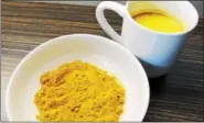  ?? MICHILEA PATTERSON — DIGITAL FIRST MEDIA ?? Turmeric seasoning is displayed in a bowl. The spice can be added to milk to create something known as “golden milk.” Giant Food Store dietitian Christina Fava predicts that turmeric will be very popular in 2017.