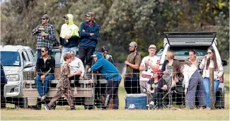  ??  ?? Cars packed around the small Tolaga Bay ground to watch East Coast face Wanganui, the reigning Heartland champions.