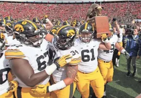  ?? RICK WOOD / MILWAUKEE JOURNAL SENTINEL ?? The Iowa Hawkeyes beat Wisconsin, 10-6, in Madison in 2015 on their way to the Big Ten West Division title.