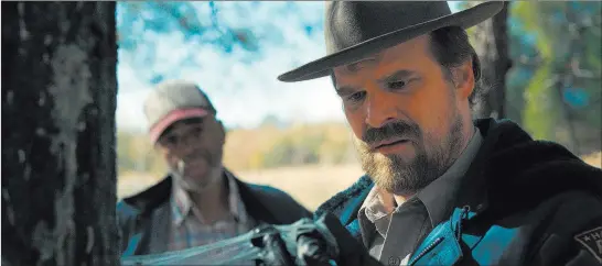  ??  ?? David Harbour says his “Stranger Things” character, Police Chief Jim Hopper, got to go “on such a classic hero’s journey” in the first season of the popular series. Netflix