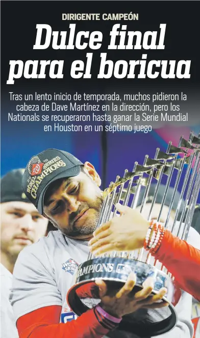  ?? Ap / matt slocum ?? El boricua Dave Martínez sostiene el trofeo de campeonato tras la victoria de los Nationals en Houston en el séptimo juego.
