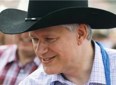  ?? LARRY MACDOUGAL/THE CANADIAN PRESS ?? Stephen Harper’s western tour included stops where government money, lots of it, was spread around, Gillian Steward writes.
