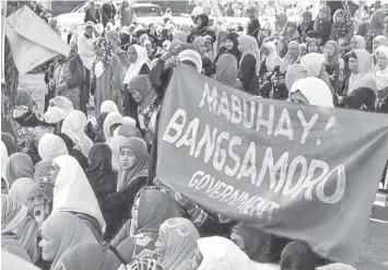  ?? FILE ?? In this undated July 2018 file photo, supporters of the Bangsamoro Basic Law—later renamed the Bangsamoro Organic Law—gather to urge passage of the bill that would create the new Bangsamoro Autonomous Region in Muslim Mindanao.