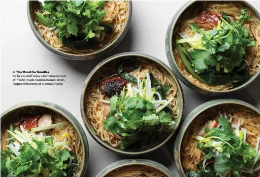  ??  ?? In The Mood For Noodles
At Ta Vie, staff enjoy a homemade bowl of freshly made noodles in duck broth, topped with plenty of aromatic herbs