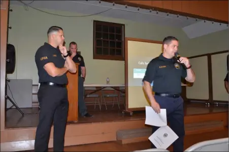  ??  ?? Calexico Police Offices Associatio­n President Sean Acuña speaks to community members Wednesday during the first of a series of town hall meetings aimed at informing the public of the costs and concerns associated with the potential disbandmen­t of the...