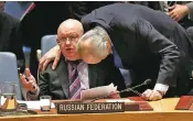  ?? JULIE JACOBSON/THE ASSOCIATED PRESS ?? Russian Ambassador to the United Nations Vasily Nebenzya, left, talks with Syria’s Ambassador Bashar Ja’afari on Tuesday during a Security Council meeting at the U.N.