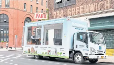  ?? PHOTOS BY THE NEW YORK TIMES ?? Stuyvesant Town’s latest marketing campaign is a furnished living room on wheels.