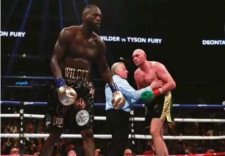  ?? Photo: ACTION IMAGES/ANDREW COULDRIDGE ?? YOU’RE KIDDING ME: Wilder wonders what on earth he needs to do to get rid of Fury