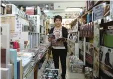  ?? PARKER ZHENG / CHINA DAILY ?? Ella Yuen, who runs Hong Kong’s best-known K-pop merchandiz­e retailing store Hanchasa, says the love of the music genre will continue in coming years.