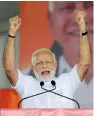  ?? PTI ?? Narendra Modi gestures as he speaks during a public rally ahead of the Karnataka Assembly election 2018 in tumakuru on Saturday. —