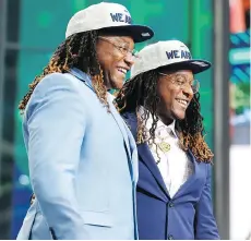  ?? JAE S. LEE/THE ASSOCIATED PRESS ?? Shaquem Griffin and twin Shaquill pose at the NFL draft Saturday after the former was drafted by the Seahawks.