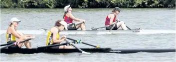  ?? BOB TYMCZYSZYN/POSTMEDIA NEWS ?? St. Catharines Rowing Club’s Michelle Kerr and Susan Nichol win the women’s D double during masters rowing at the 135th Royal Canadian Henley Regatta Sunday in St. Catharines.
