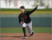  ?? COURTESY – SAN FRANCISCO GIANTS ?? San Francisco Giants pitcher Kyle Harrison throws during spring training in Scottsdale, Arizona on Friday.