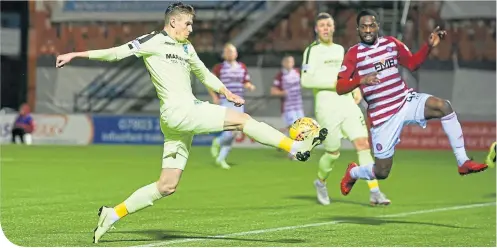  ??  ?? Hibs’ Oli Shaw scores the only goal of a scrappy game