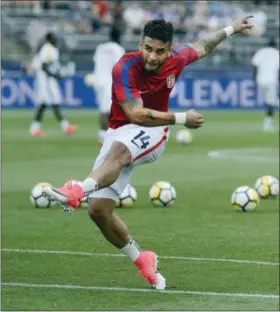  ?? JESSICA HILL - THE ASSOCIATED PRESS ?? In this July 1, 2017, file photo, United States’ Dom Dwyer warms up before the team’s internatio­nal friendly soccer match against Ghana in East Hartford, Conn. Dwyer and Sydney Leroux were born abroad, came to the United States and dreamed of playing...