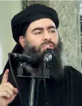  ??  ?? Dal pulpito Abu Bakr Al Baghdadi, 47 anni nella moschea di Al Nuri a Mosul, in Iraq, nel luglio 2014