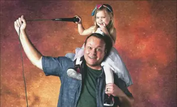  ?? Lois Stein ?? Comedian Aaron Kleiber, shown in 2018 with his daughter, Abby, is keeping busy but fears live shows would endanger his family.