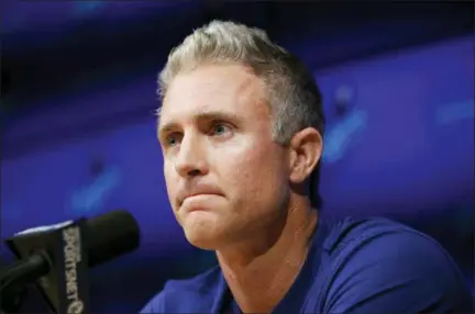 ?? JAE C. HONG — THE ASSOCIATED PRESS ?? Los Angeles Dodgers infielder Chase Utley pauses for a moment during a news conference held to announce his retirement at the end of the season, Friday in Los Angeles.
